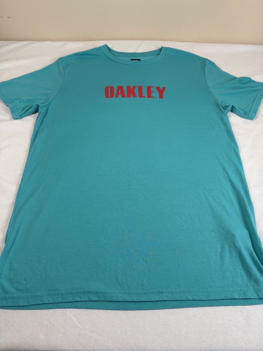 Share Oakley Men's Logo Athletic Shirt Size XL - Light Blue